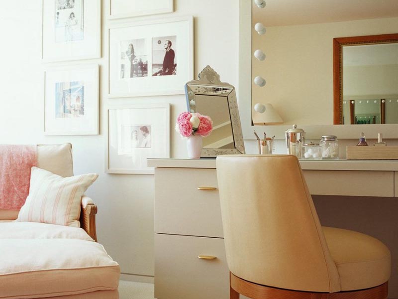 beige and pink bedroom with vanity